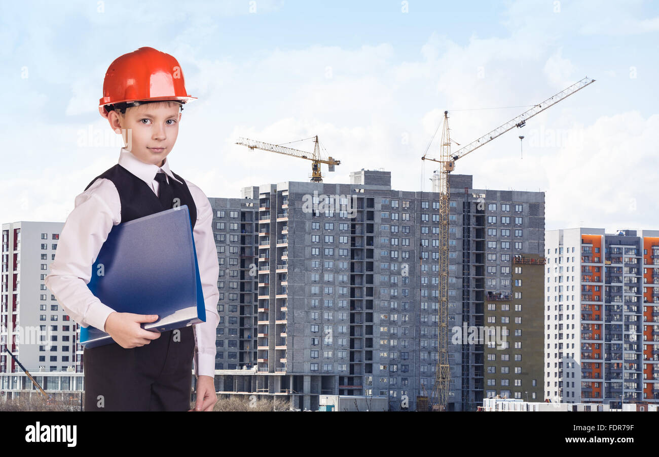 Baumeister-junge in der orange Helm Stockfoto