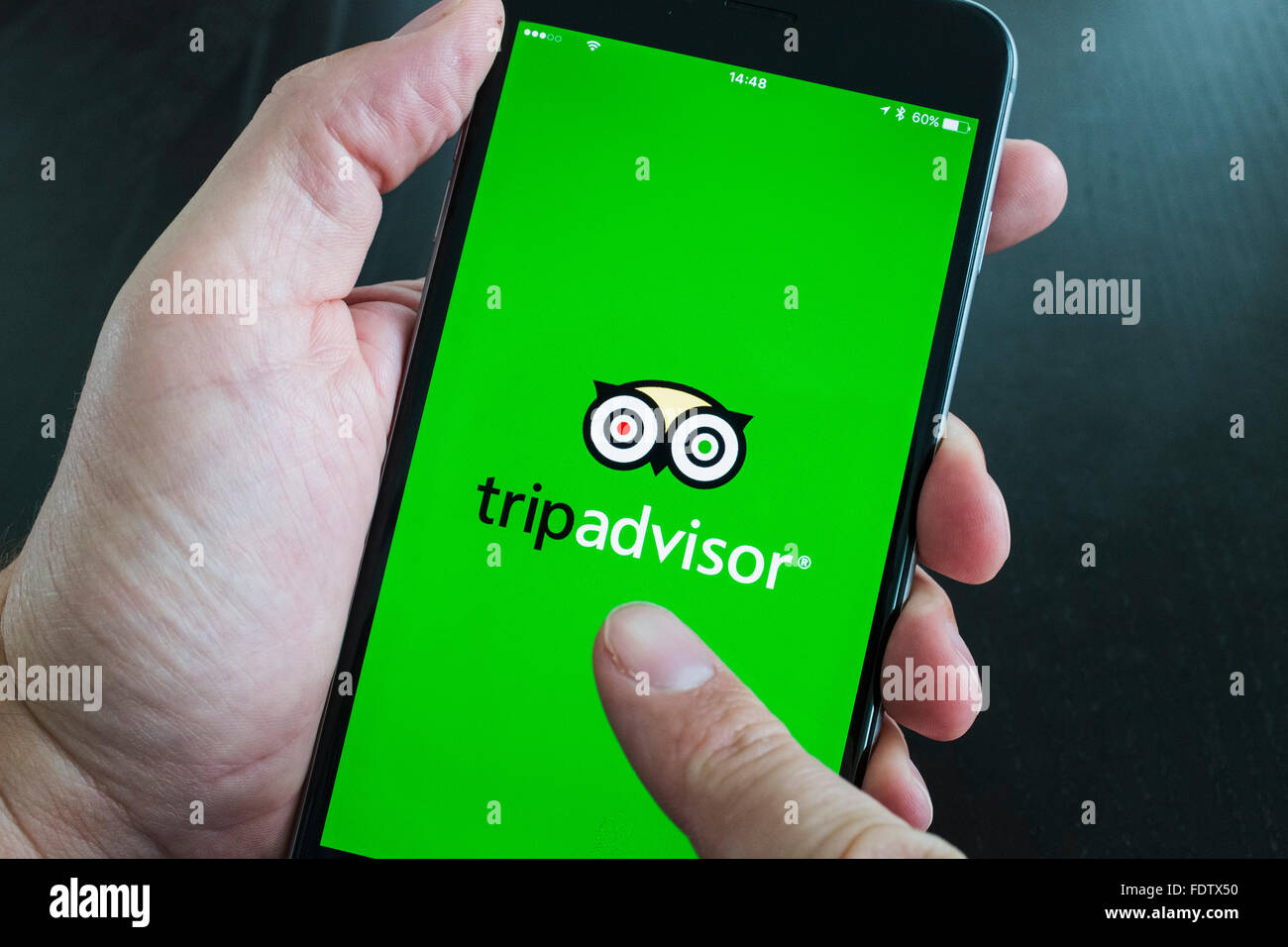 Tripadvisor Travel App-Logo auf dem Bildschirm des Smartphones Stockfoto