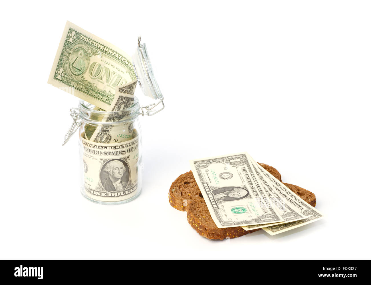 Einkommen sichern in einem Topf und die Ausgaben für Lebensmittel Stockfoto