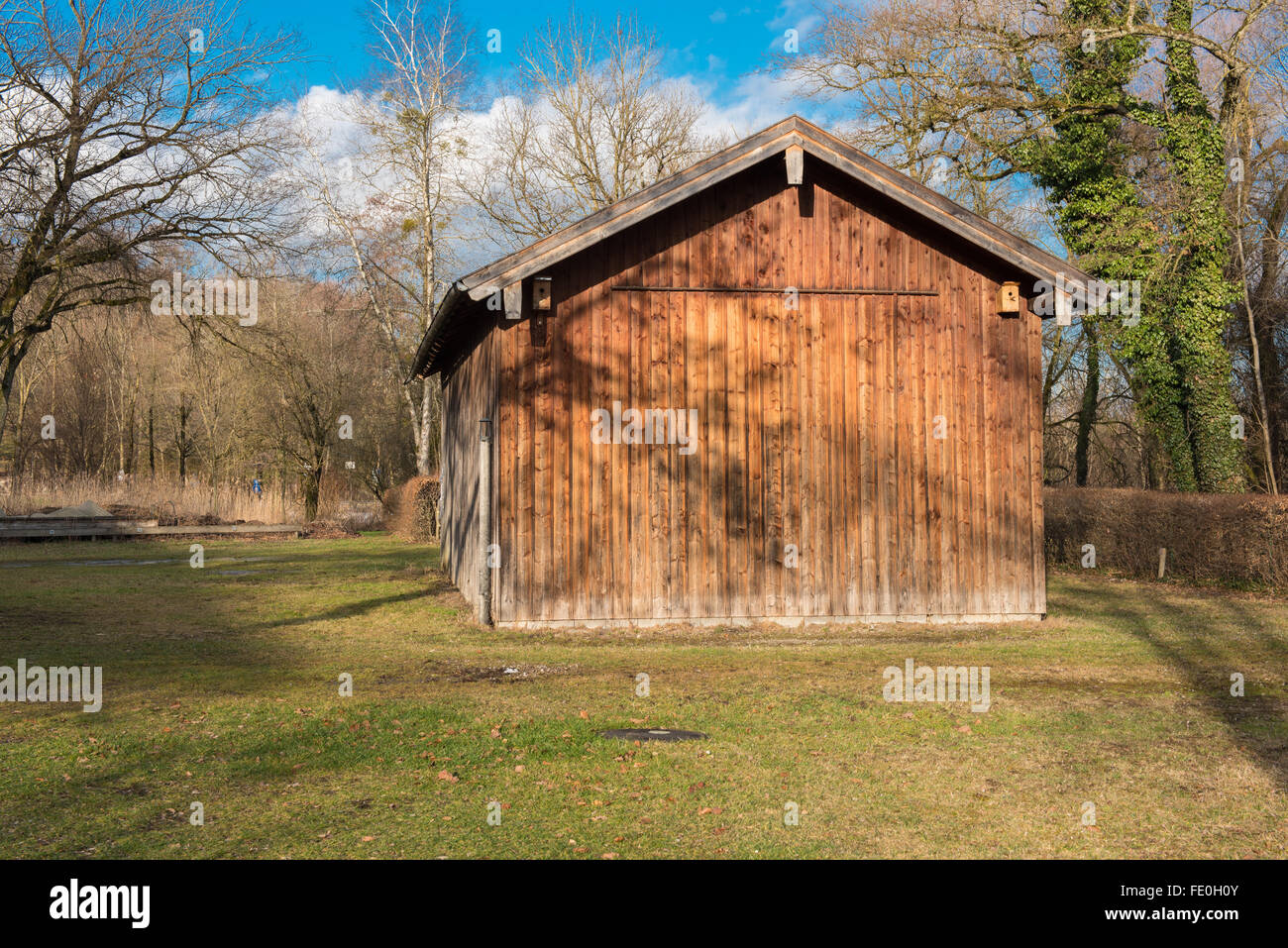 Holzboot Haus am Chiemsee in Bayern Stockfoto