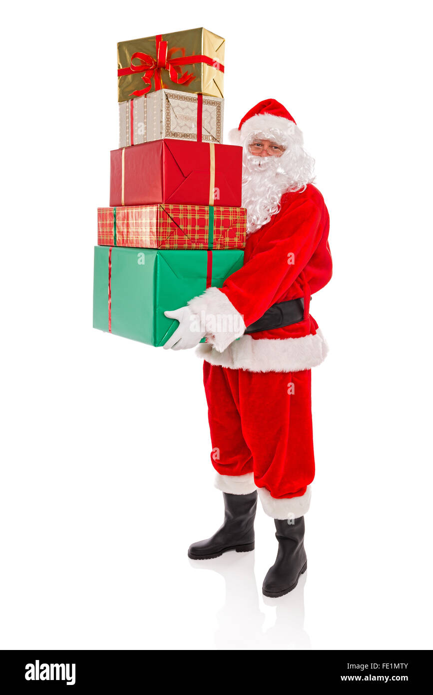 Weihnachtsmann oder Santa Claus mit einem Stapel von Geschenk verpackt präsentiert mit Bänder und Bögen, auf einem weißen Hintergrund. Stockfoto