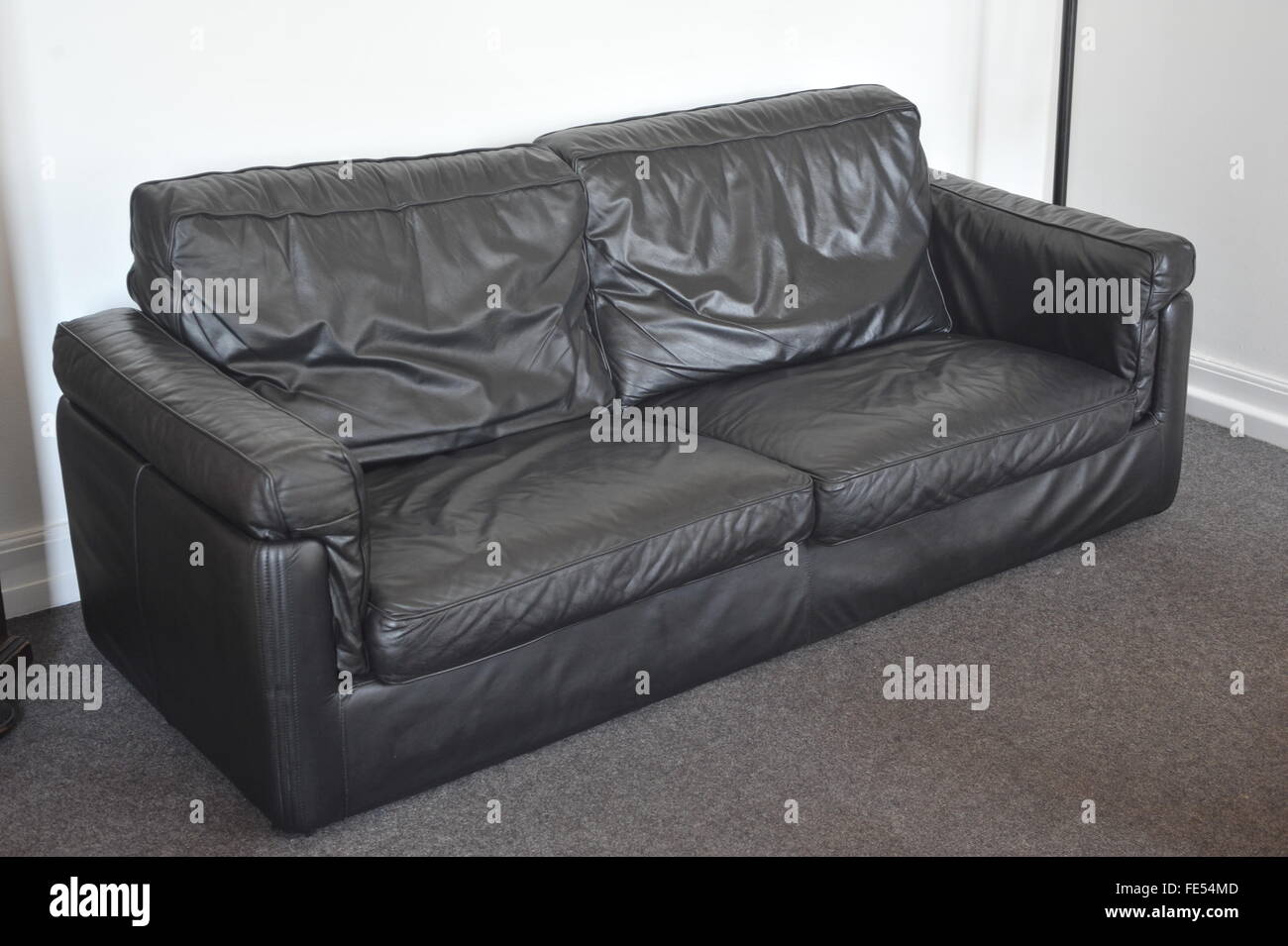 schwarzes Ledersofa, Möbel, Lounge verwendet Stockfoto