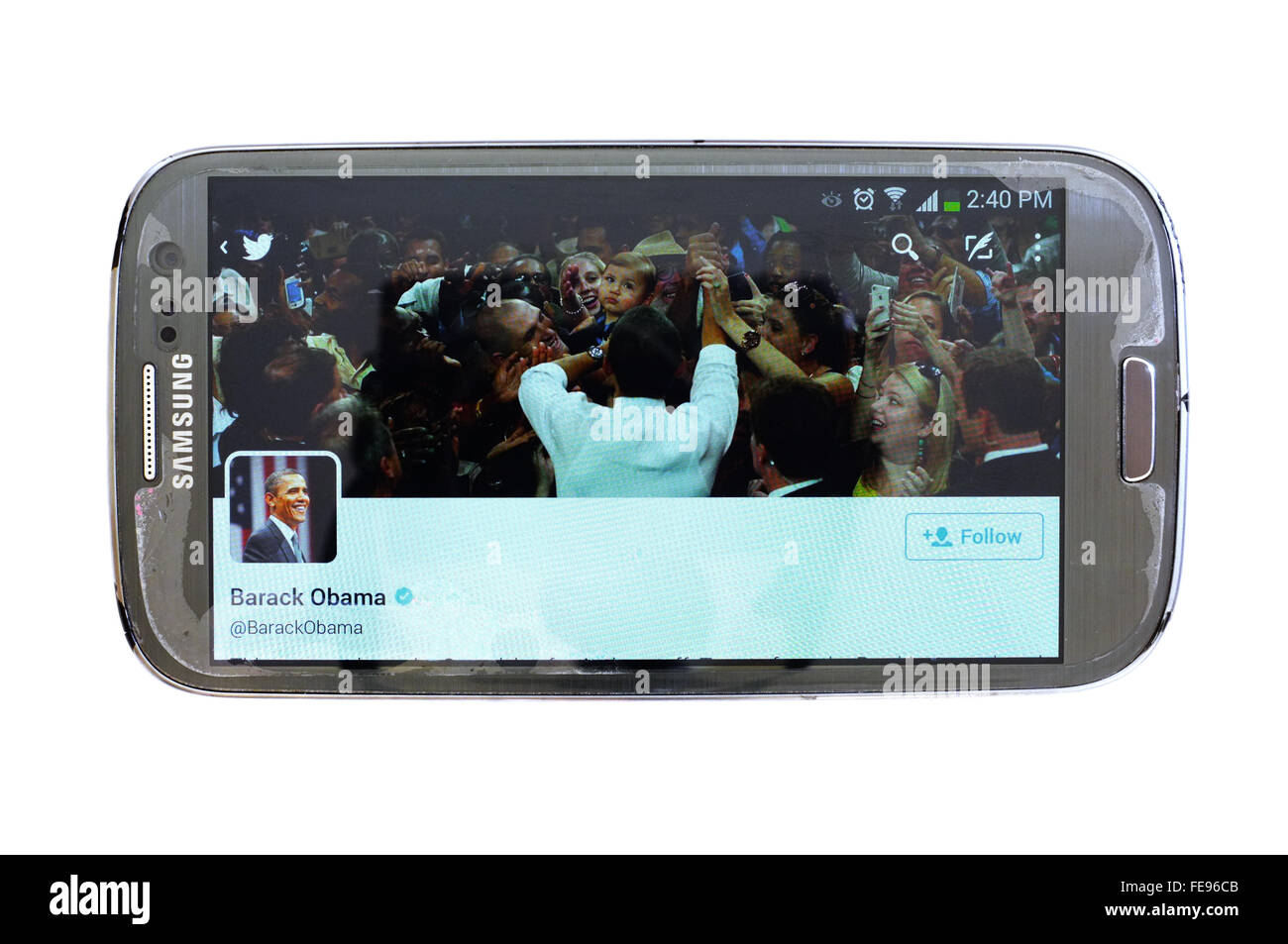 Barack Obamas Twitter-Account auf einem Smartphonebildschirm vor weißem Hintergrund fotografiert. Stockfoto