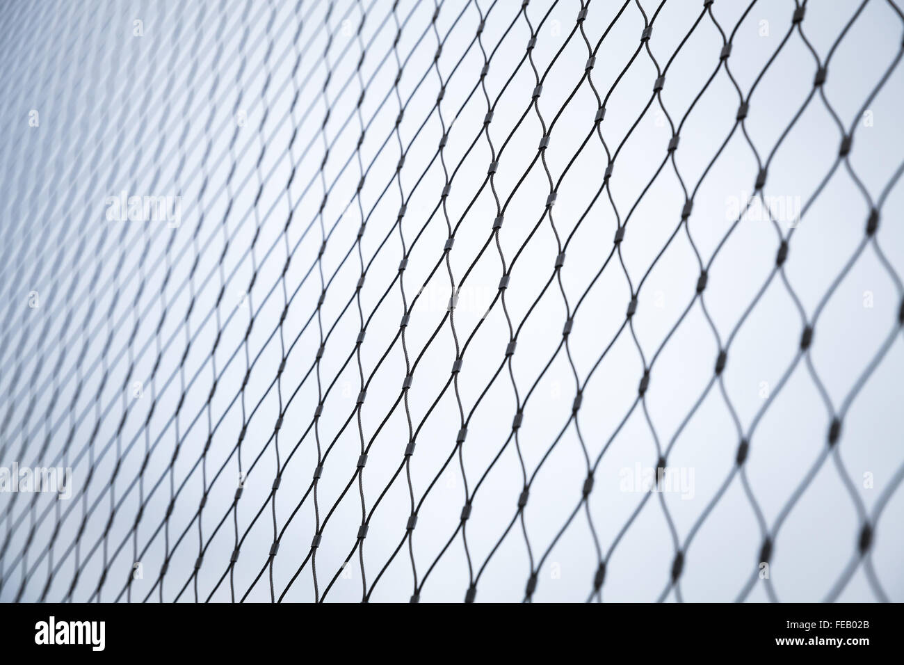 Stahl-Kette Link Zaun Hintergrundtextur mit selektiven Fokus Stockfoto
