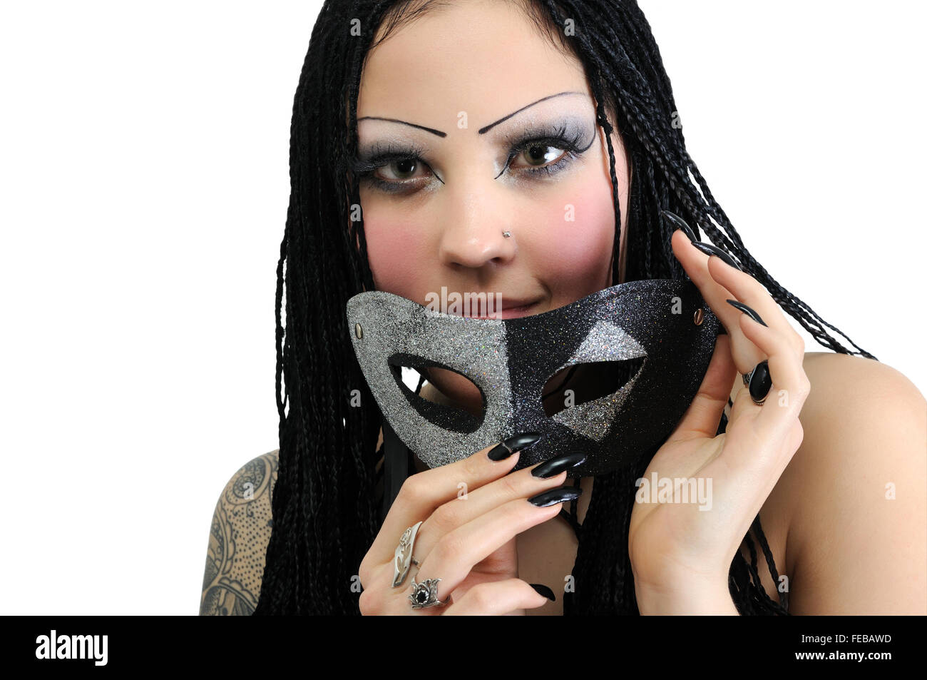 Porträt des jungen stilvolle Frau, hält venezianischen Maske Stockfoto