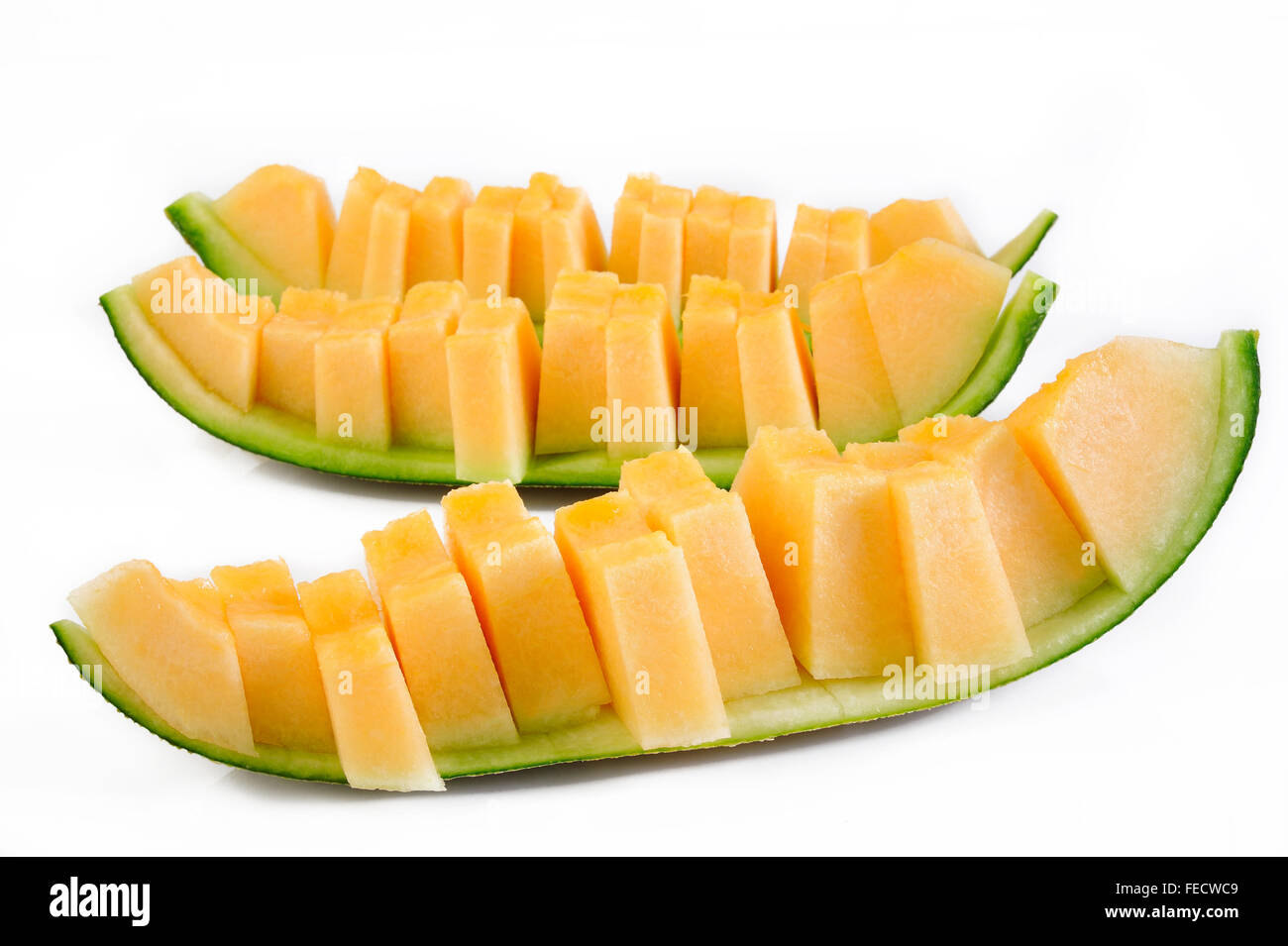 Melonenscheiben auf weißem Hintergrund Stockfoto