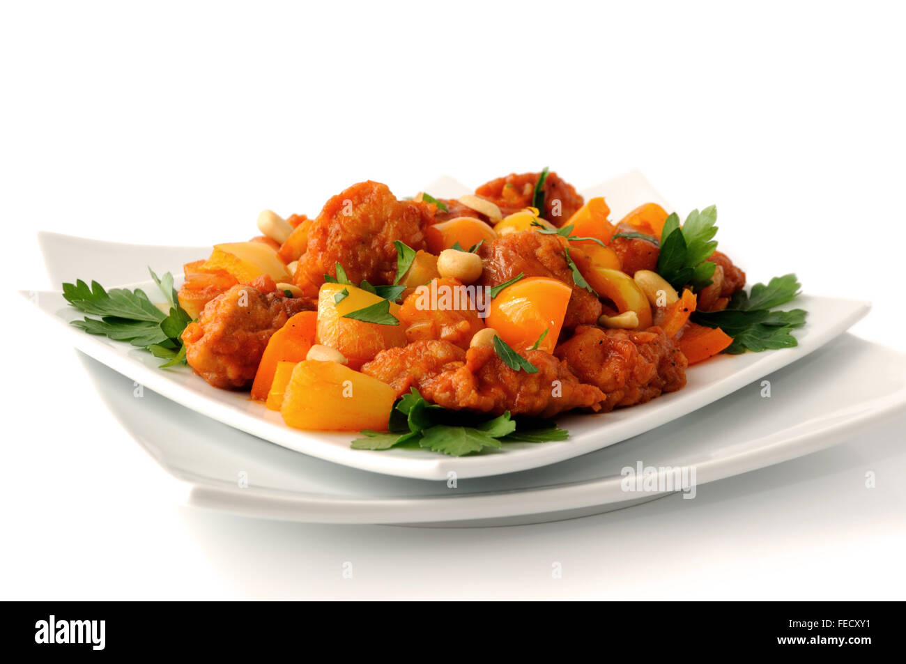 Schweinefleisch im Teig mit Ananas und Paprika in süß-saurer Soße mit ...