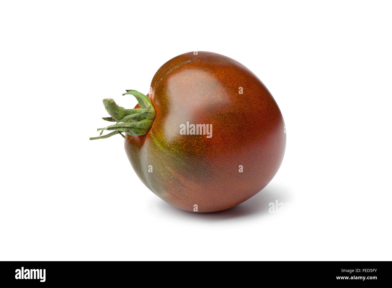 Lila Beefsteak Tomaten auf weißem Hintergrund Stockfoto