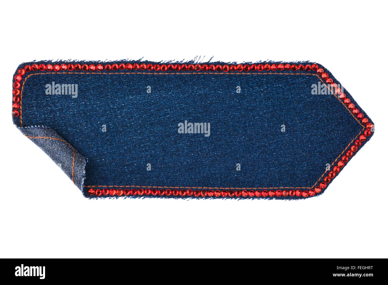Pfeil, gemacht aus Denim mit Strasssteinen, isoliert auf weißem Hintergrund Stockfoto