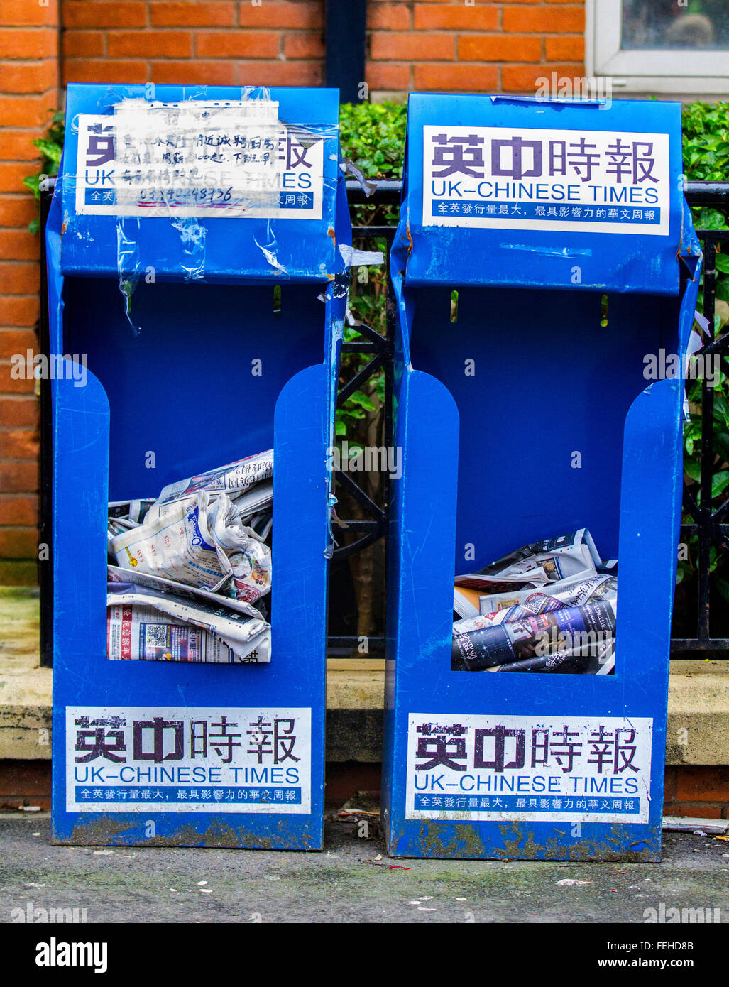 Karton für die China Times, Getränkeautomat, ausländische Zeitungen in Chinatown, Manchester, UK Stockfoto