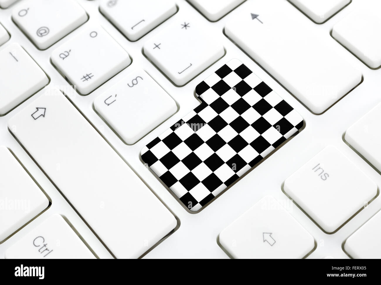 Gran Prix Autorennen Schach Flagge Konzept zu beenden, geben Sie Taste auf weiße Tastatur Stockfoto
