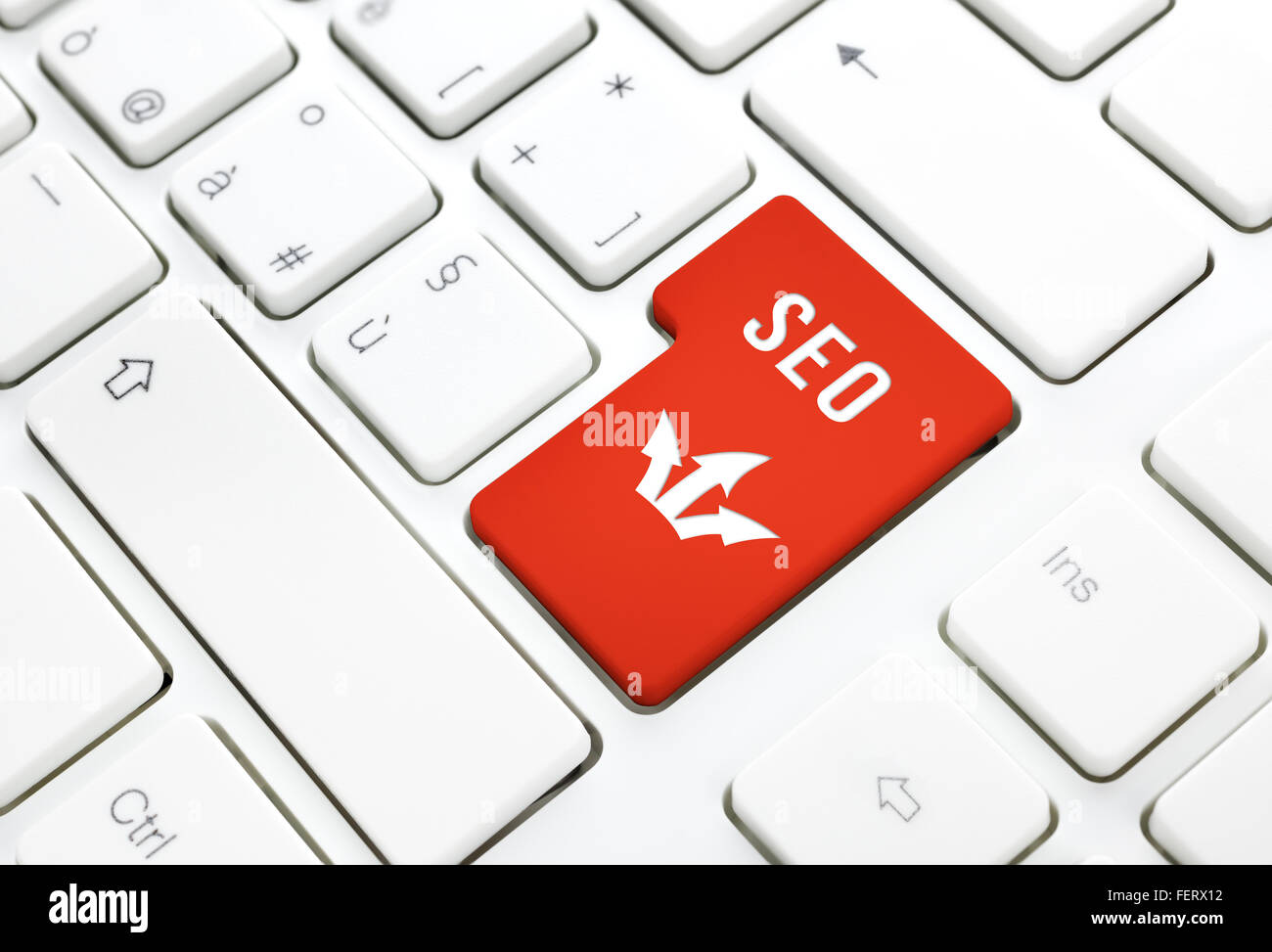 SEO-Business-Konzept, rote eingeben oder Taste auf weiße Tastatur Fotografie. Stockfoto