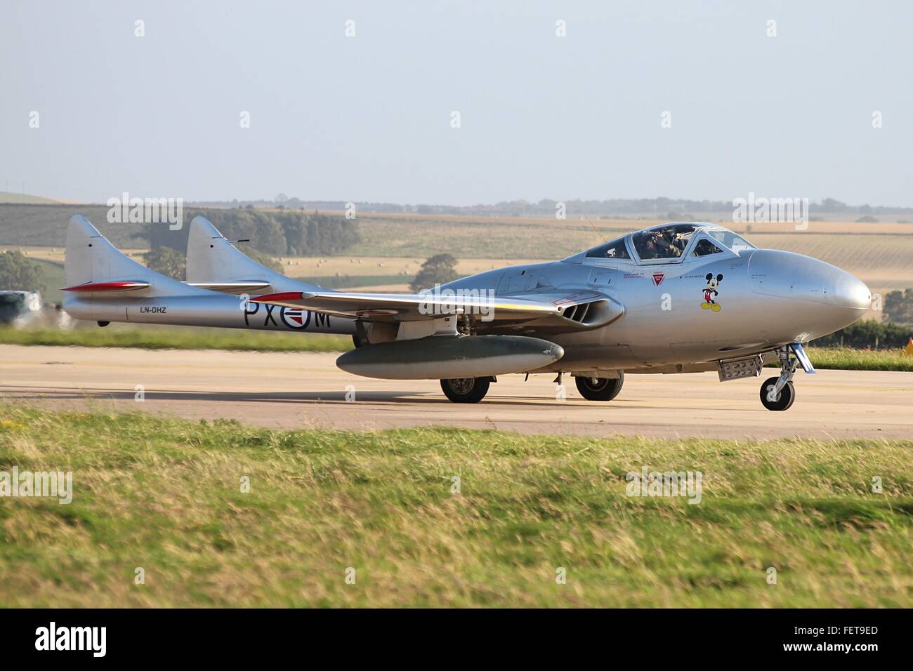 Die norwegische Luftwaffe historische Staffel Vampire T55 Leuchars Air Show 2012.  Beachten Sie die Mickey-Mouse-Nose-Art. Stockfoto