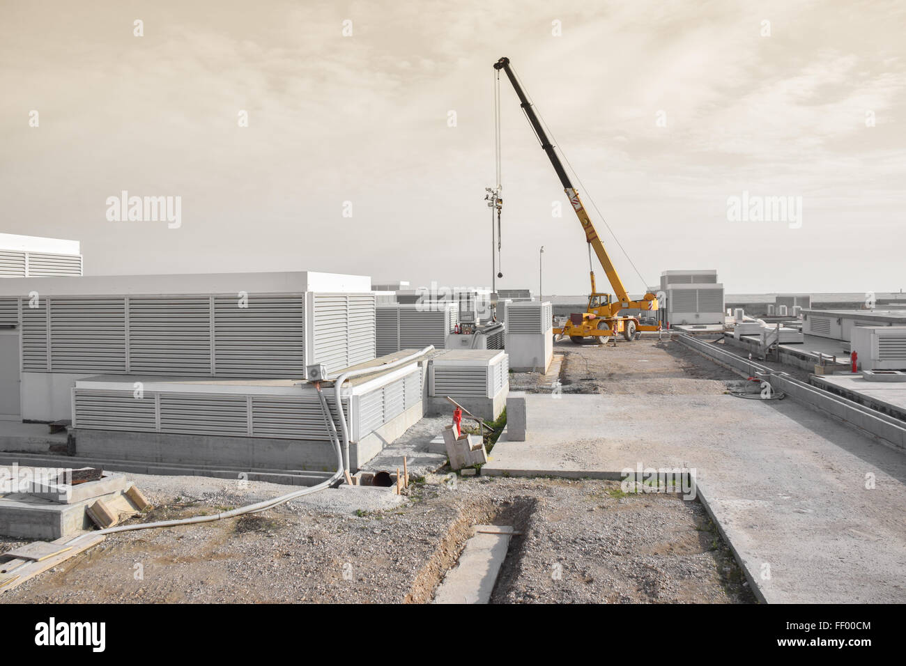 Arbeiten im Innern einer Baustelle Stockfoto