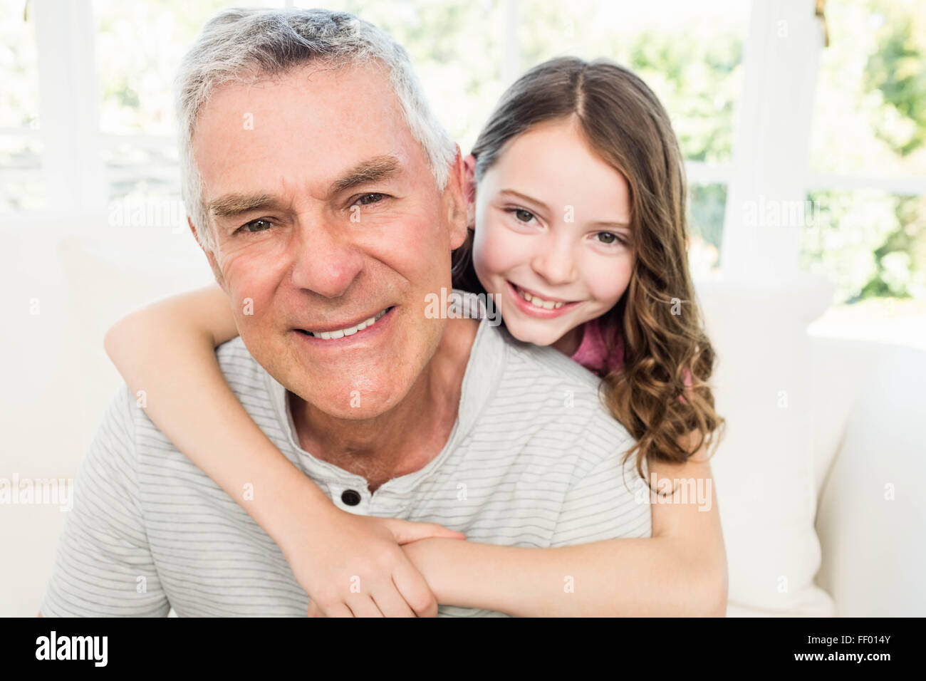 Porträt von Opa und Enkelin Stockfoto