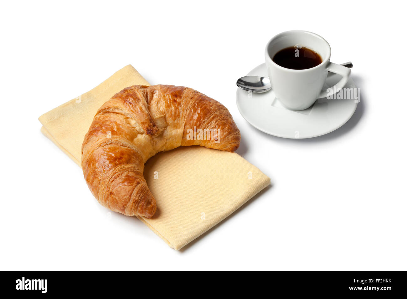 Frühstück mit französischen Croissant und Espresso Kaffee auf weißem Hintergrund Stockfoto