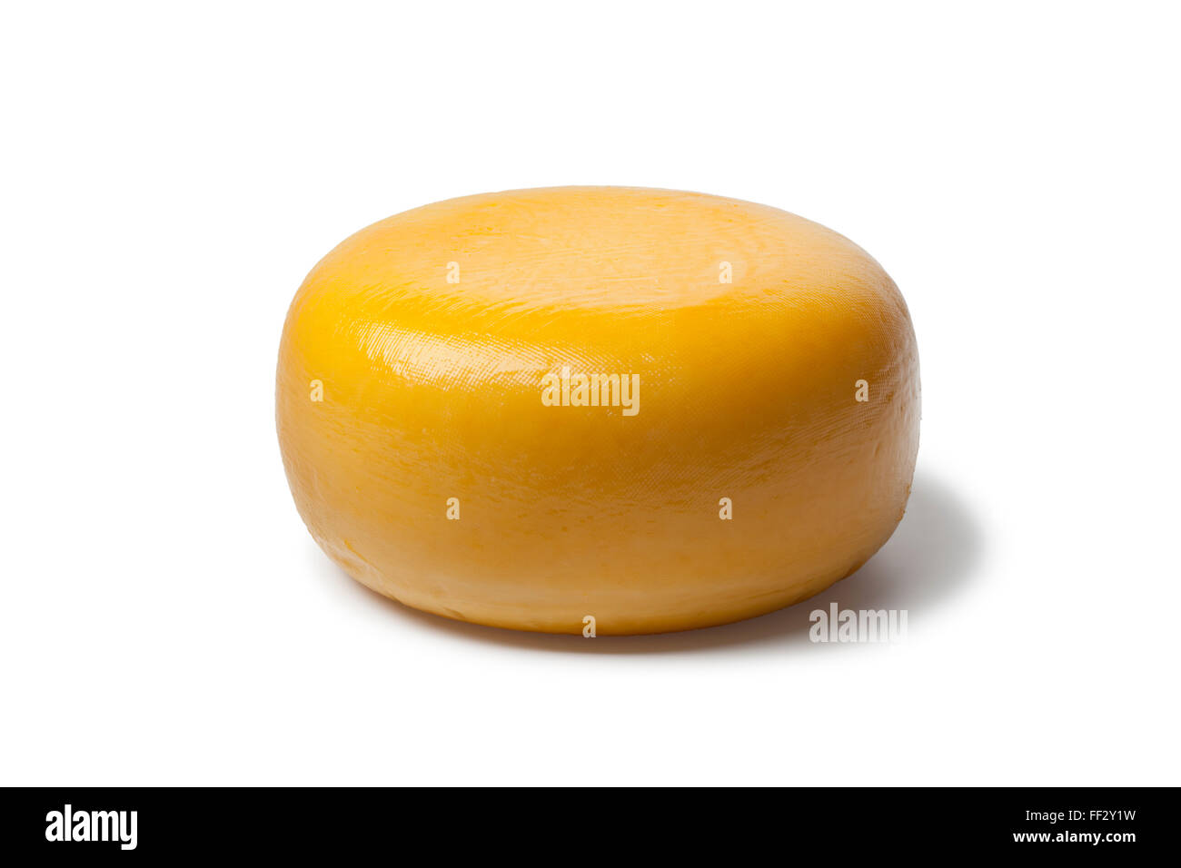 Ganz gelb holländischen Gouda-Käse auf weißem Hintergrund Stockfoto