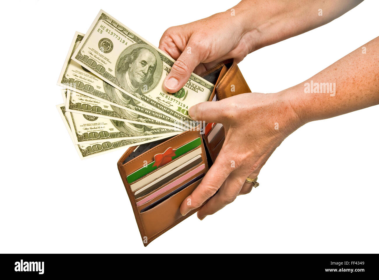 Zahlung mit Bargeld aus der Brieftasche Hand Stockfoto