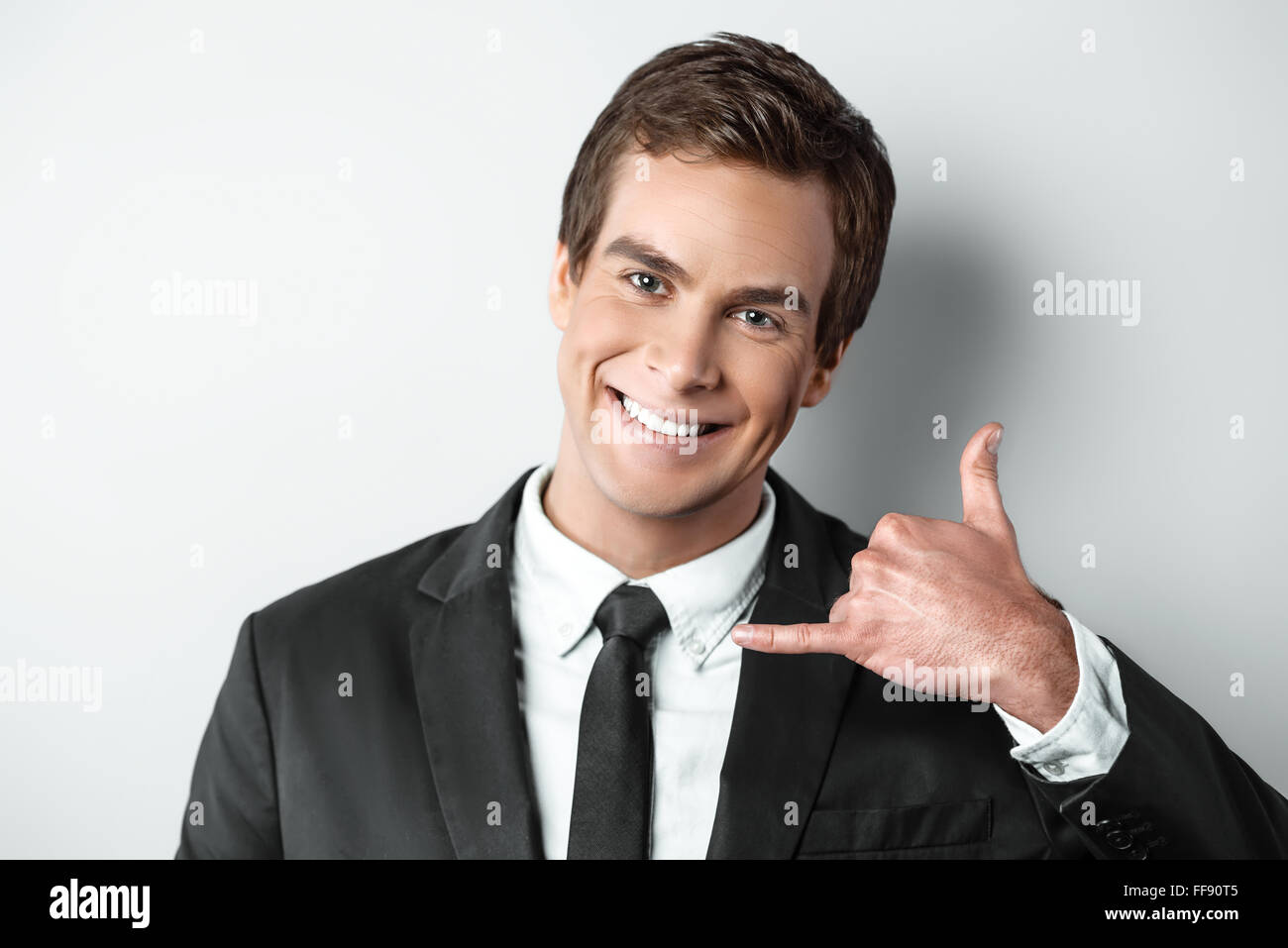 Schönes Konzept für junge hübsche Geschäftsmann Stockfoto