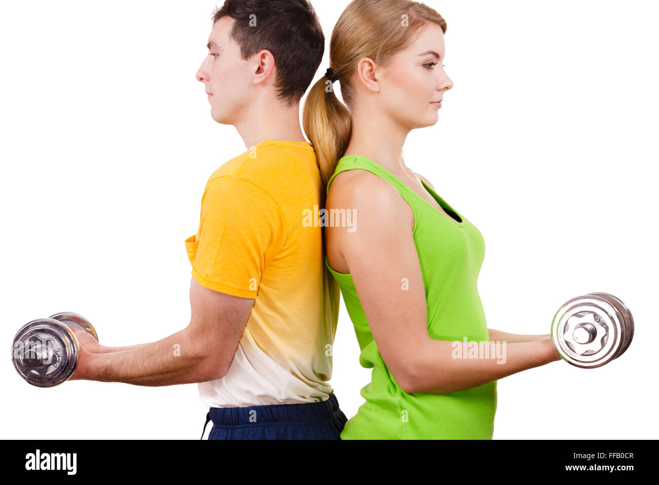 Paar fit Frau und starker Mann mit Hanteln trainieren. Muskulösen Kerl und Fitness blonde Mädchen Gewichte zu heben. Bodybuilding. Stockfoto