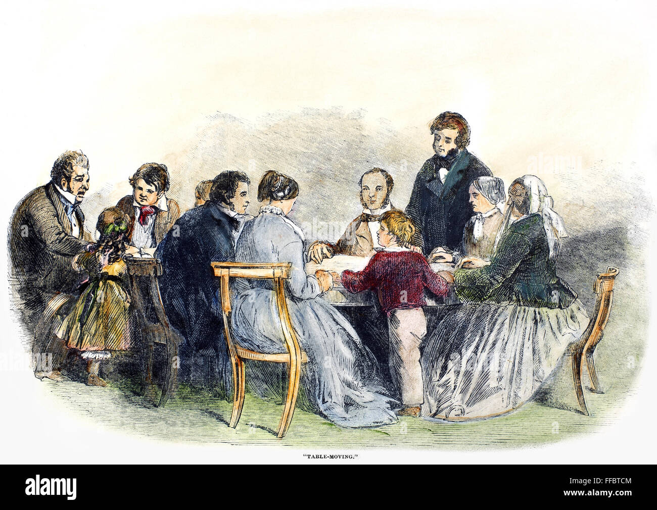 SPIRITISMUS: SEANCE, 1853. /n'Table Bewegung "bei einer englischen Séance im Jahr 1853. Zeitgenössischer Holzstich. Stockfoto