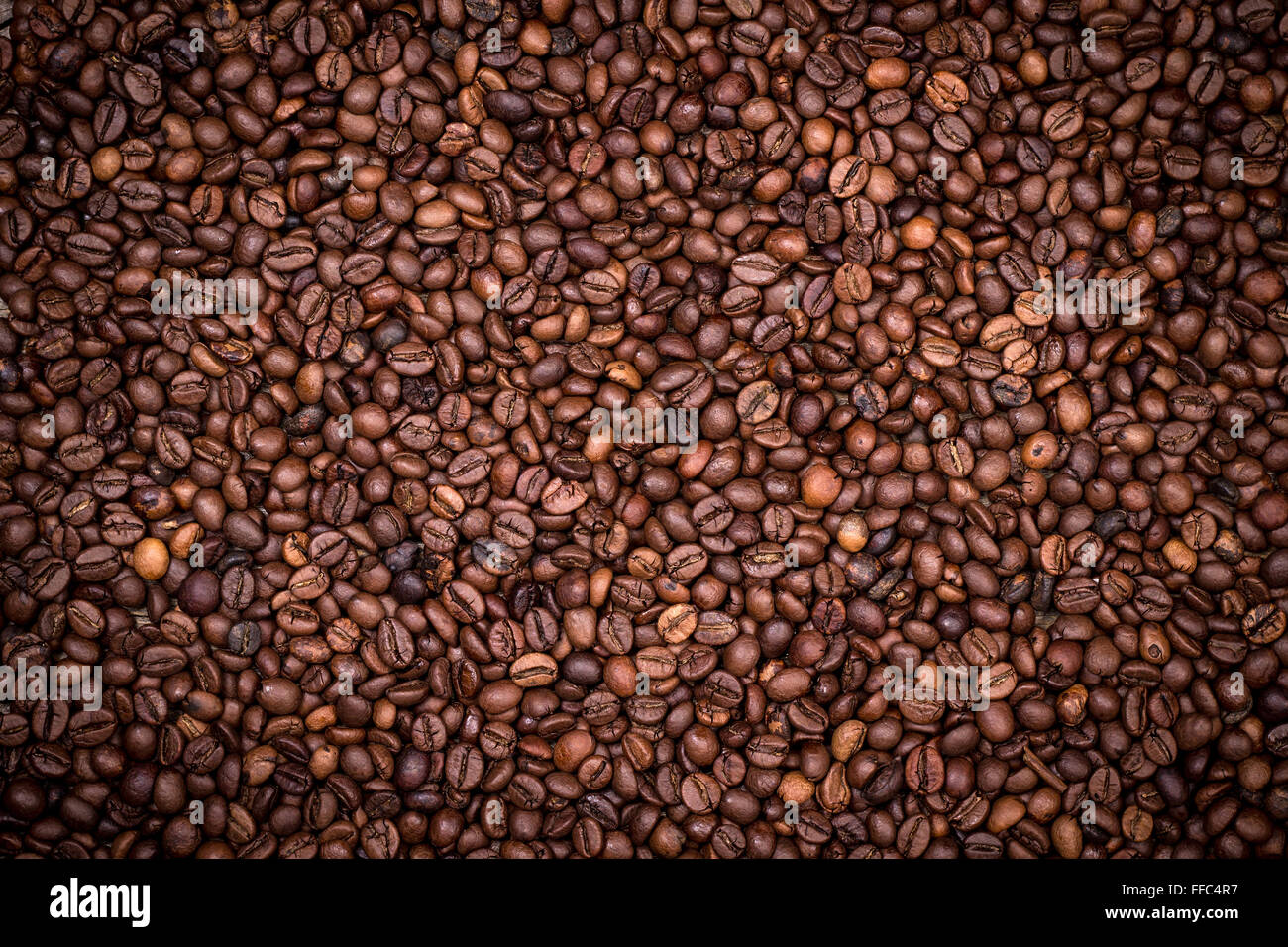 Geröstete Kaffeebohnen Hintergrund Design Tapete poster Stockfoto