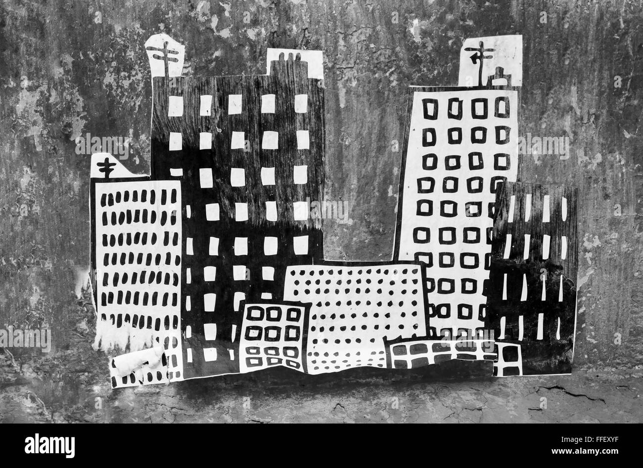 Street-Art Collage mit Wolkenkratzern und kleinere Wohngebäude in der Nacht Stockfoto