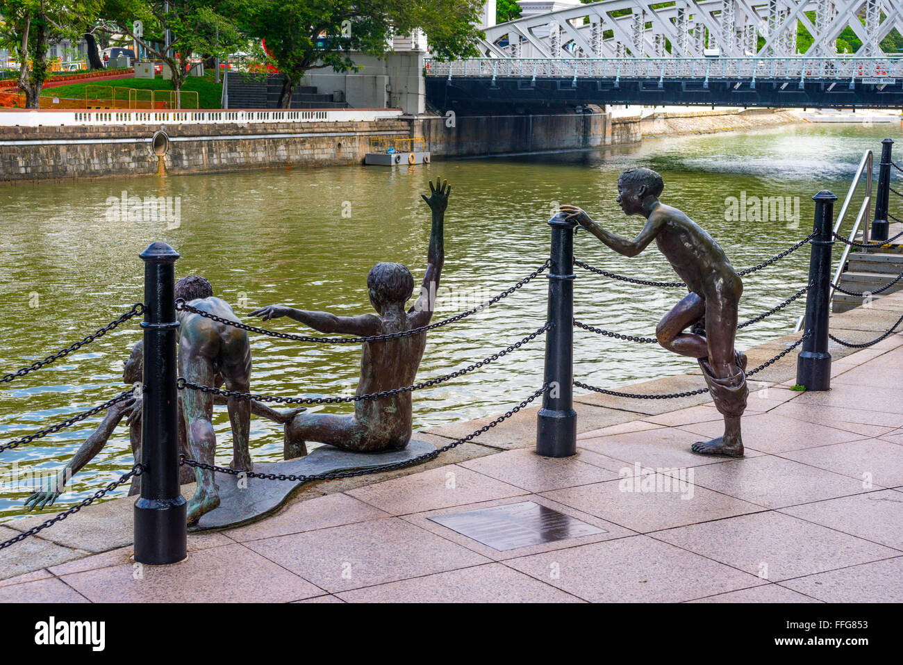 Die erste Generation, Bronze-Skulptur neben der Singapore River, Singapur Stockfoto