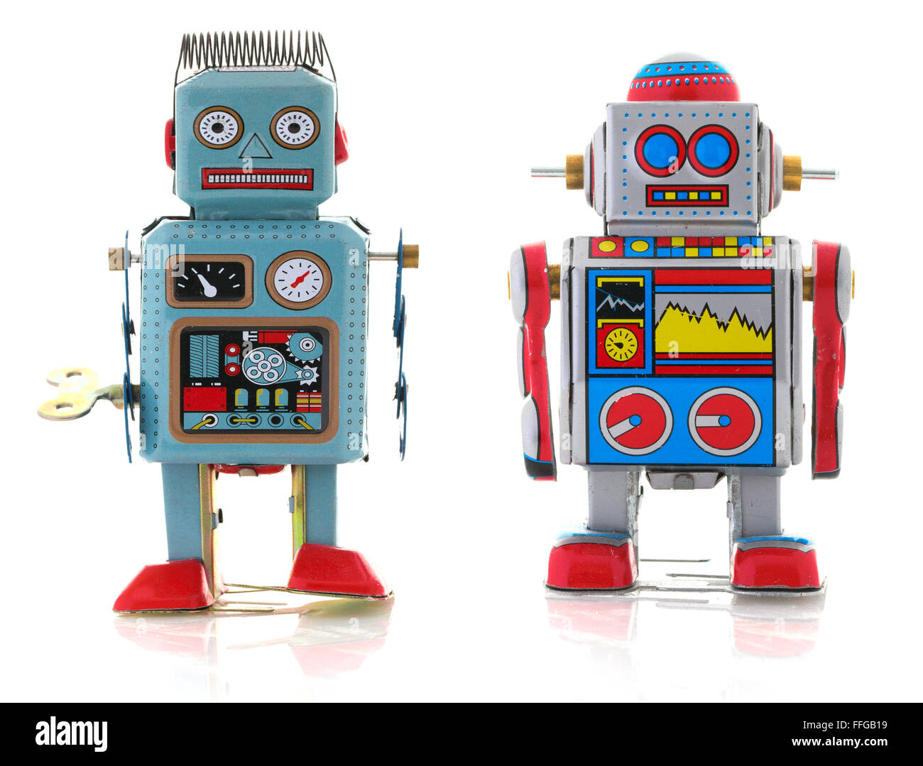 Zwei Retro-Zinn Roboter auf weißem Hintergrund Stockfoto