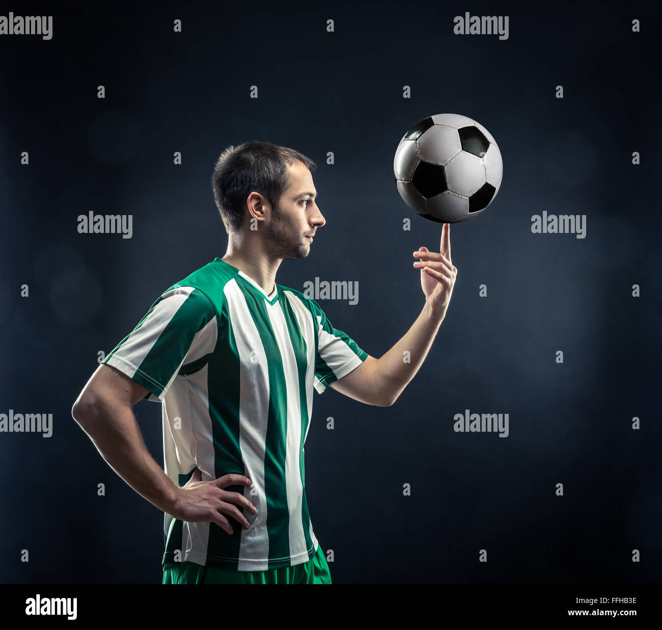 Fußball-Spieler mit ball Stockfoto