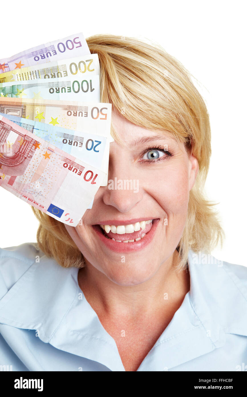 Geschäftsfrau mit Euro-Scheine vor ihren Augen Stockfoto