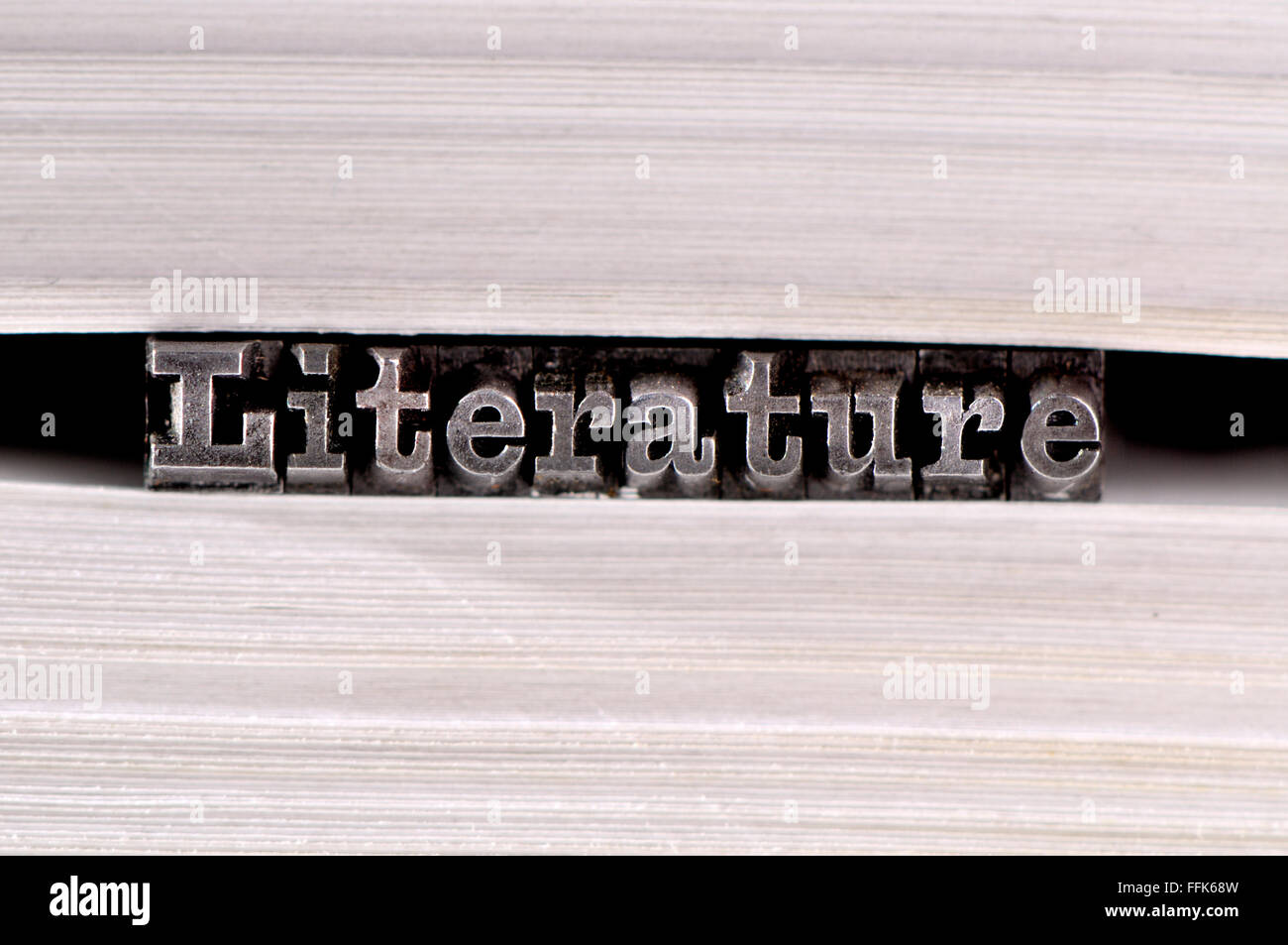 Buchdruck Zeichen Rechtschreibung aus Literatur auf den Seiten eines Buches Stockfoto