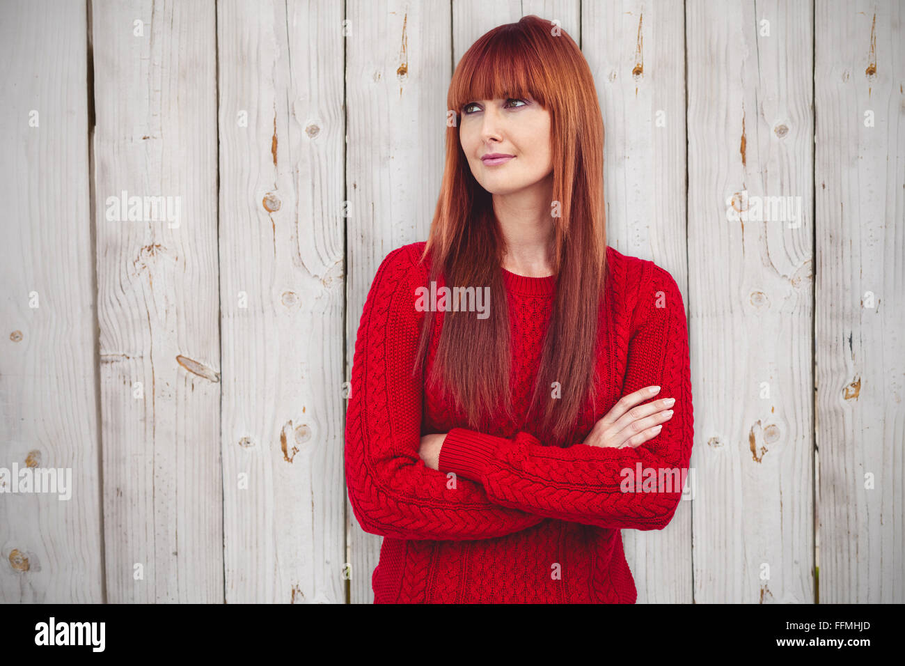 Zusammengesetztes Bild Hipster Frau mit verschränkten Armen Stockfoto