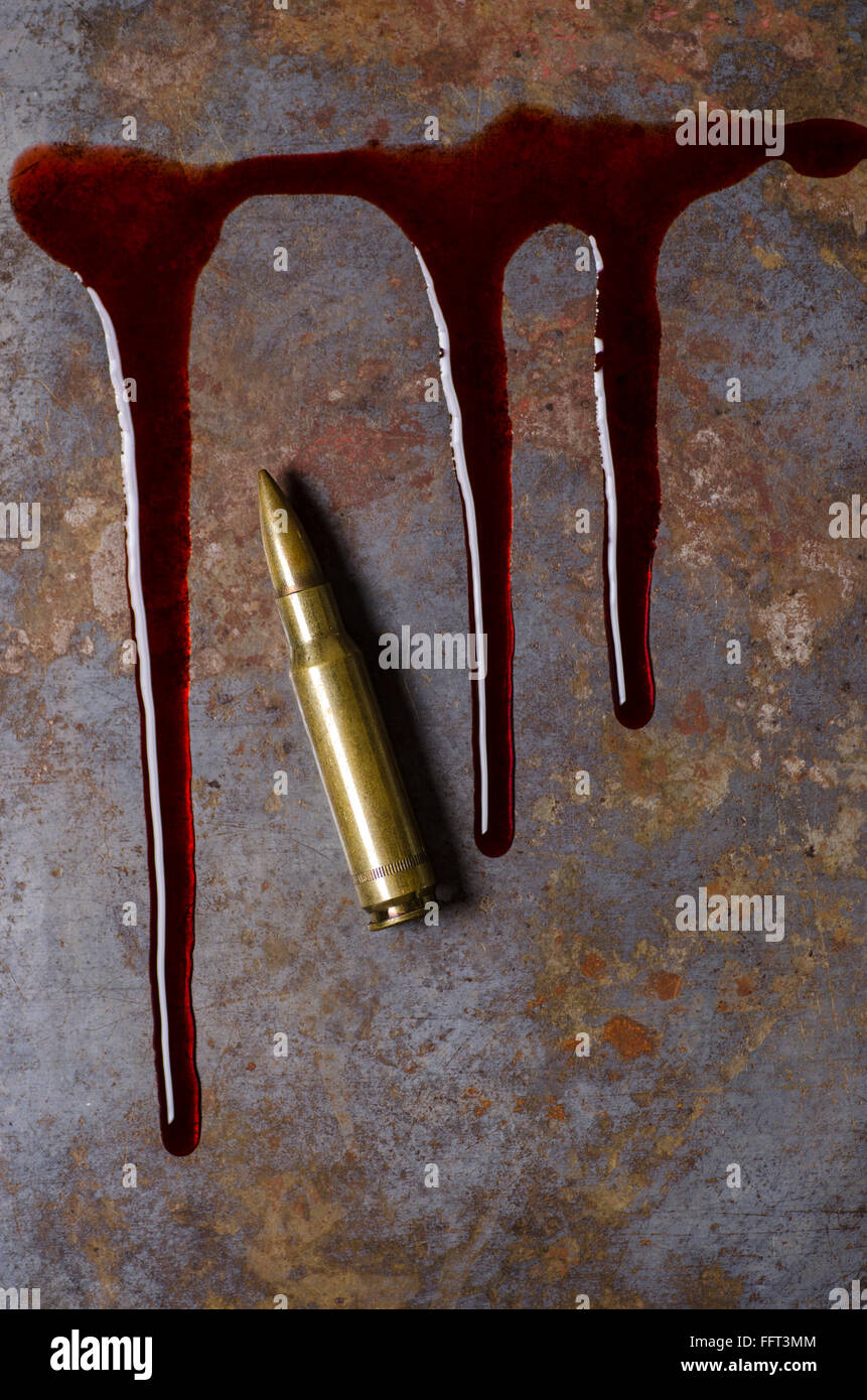 Kugel und Blut Stockfoto