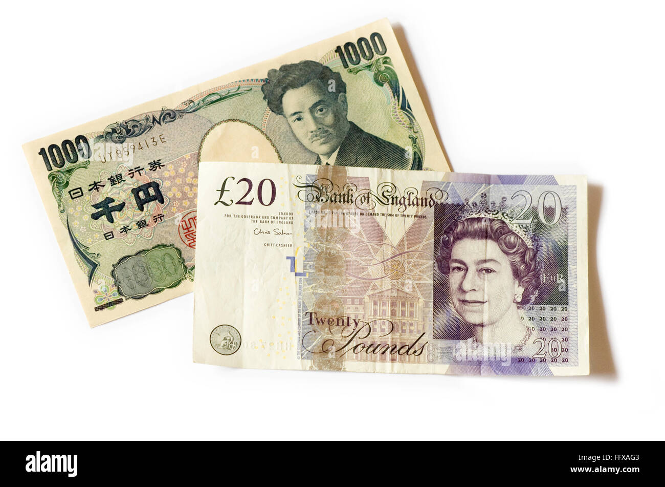 1000 Yen Hinweis neben einen 20-Pfund-Note auf einem weißen Hintergrund. Stockfoto
