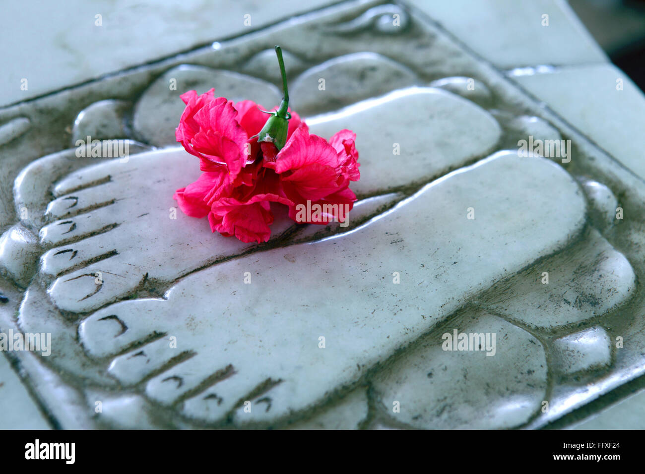 Heiligen weißen Marmor Fußdruck Stockfoto