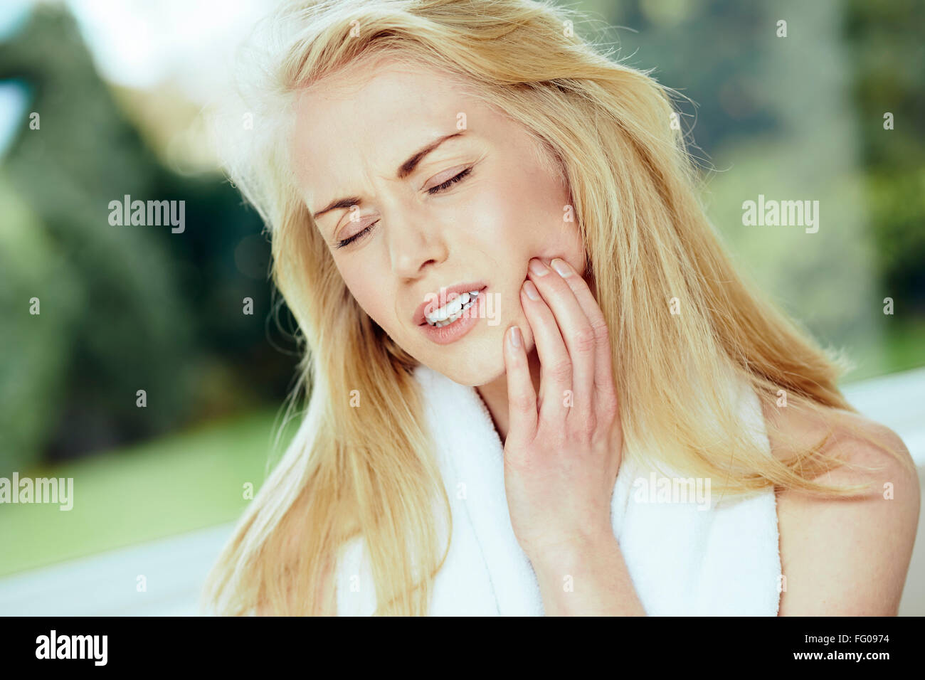 Mädchen mit Zahnschmerzen Stockfoto