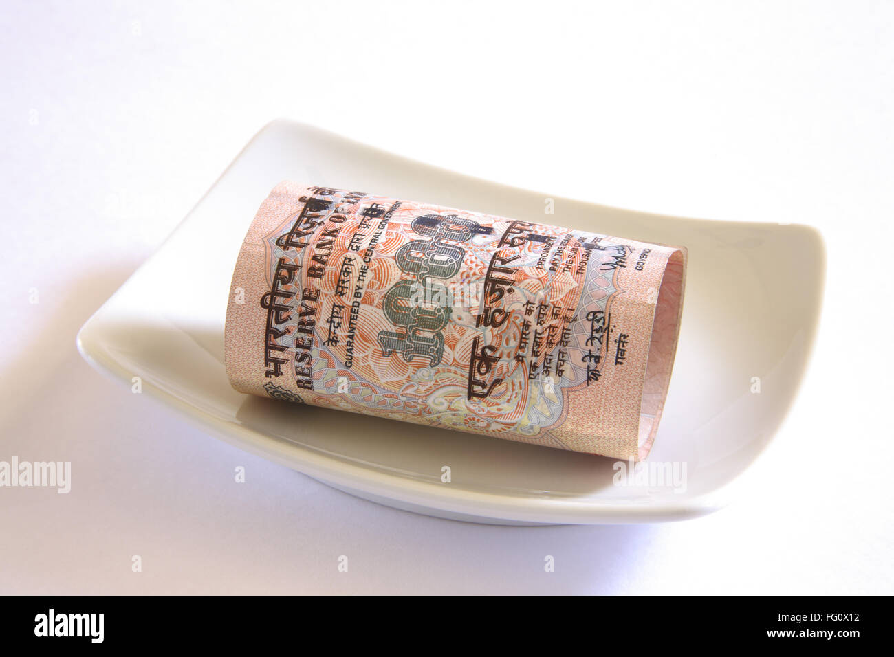 Konzept, indischer Währung ein tausend Rupien in Platte Stockfoto