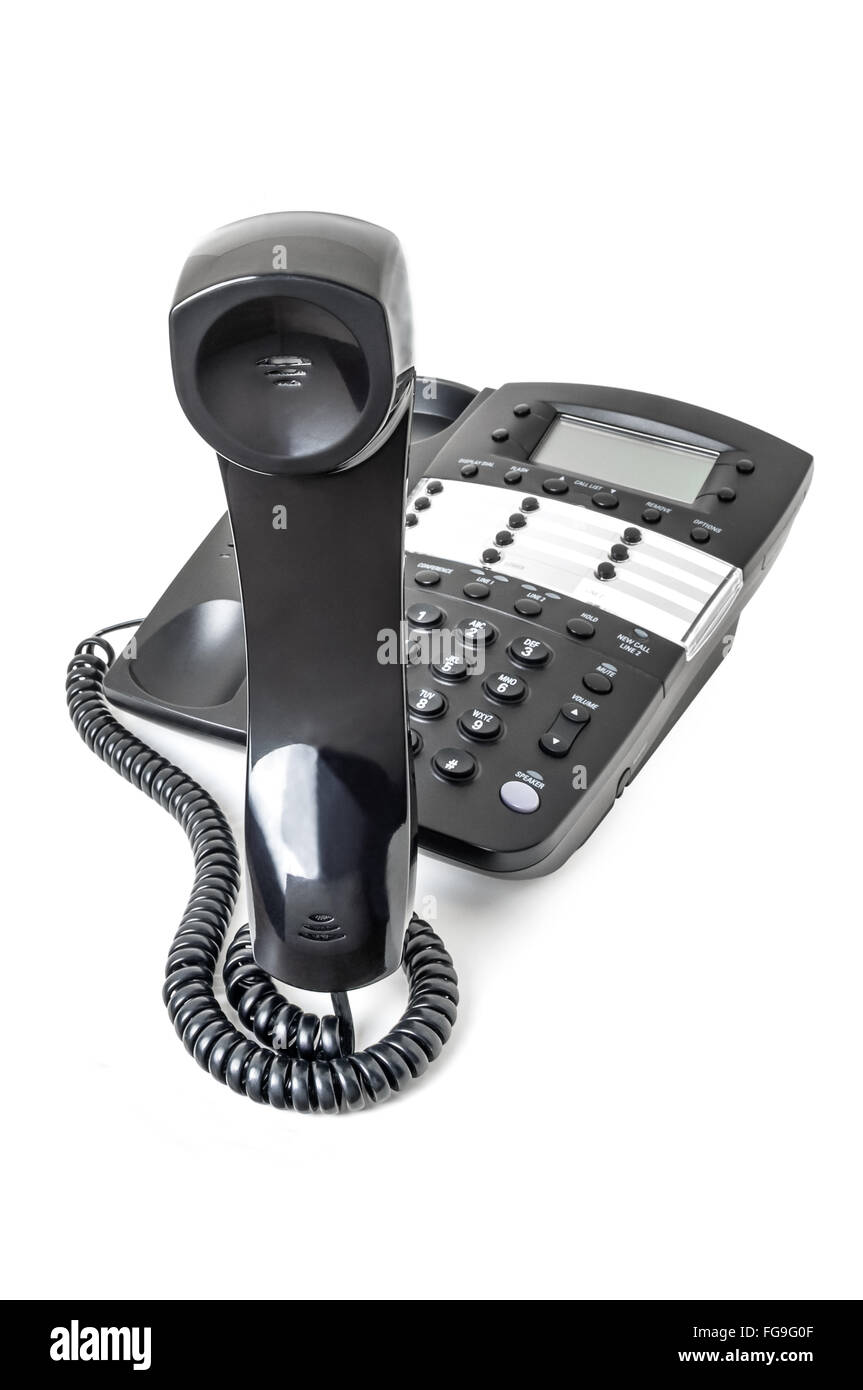 Business Festnetz-Telefon, isoliert auf weiss mit dem Empfänger aus dem Schneider in einer Position wie eine Schlange stehen. Stockfoto