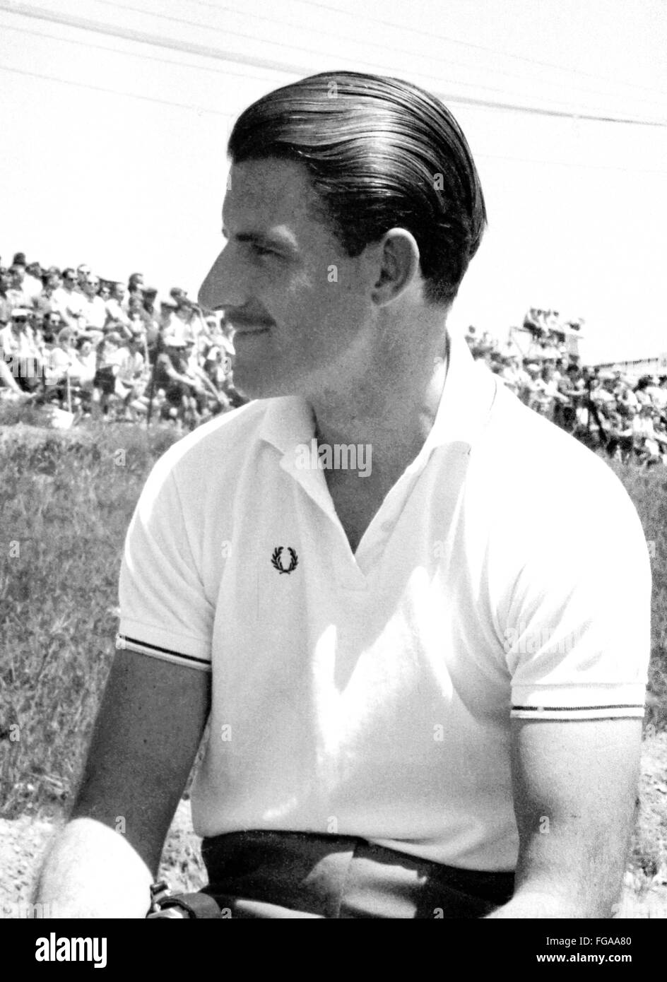 Britische Fahrer Graham Hill zu Beginn des Motorsport und formale und Grand Prix Rennen in Kanada in Mosport Rennstrecke in der Nähe von Bownmanville, Ontario, 1960 Stockfoto