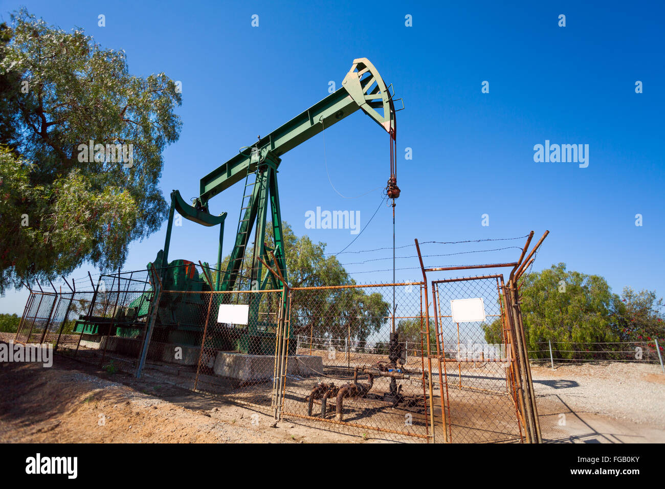 Buchsen-Extrakt Öl-Pumpe aus einem Ölfeld in USA Stockfoto