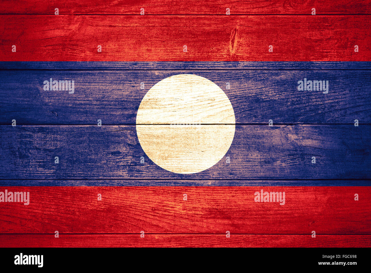 Flagge von Laos oder Banner auf hölzernen Hintergrund Stockfoto