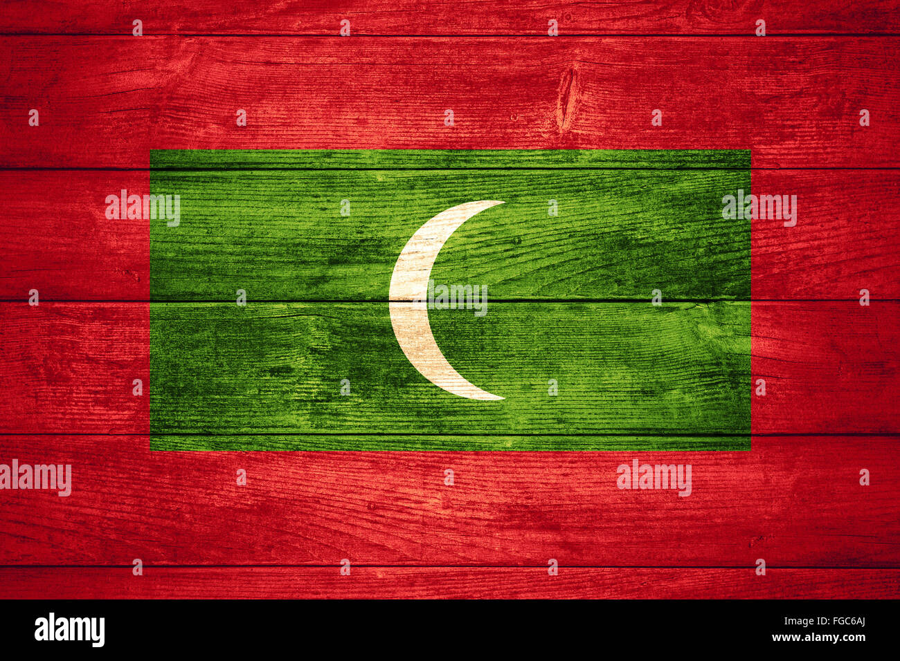 Flagge der Malediven oder Banner auf hölzernen Hintergrund Stockfoto