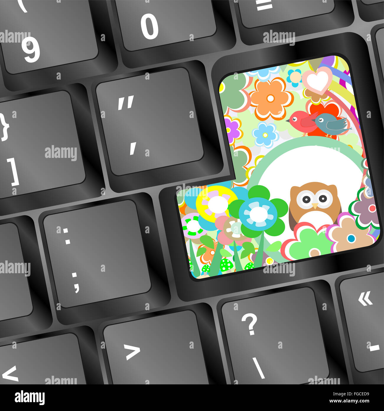 Eule auf Computer-Tastatur mit Blumen Stockfoto