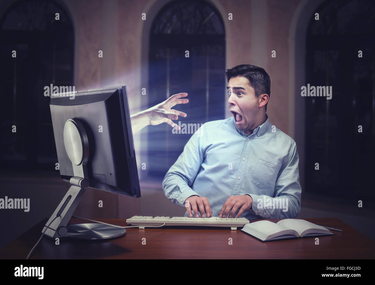 Menschliche Hand vom Bildschirm Stockfoto