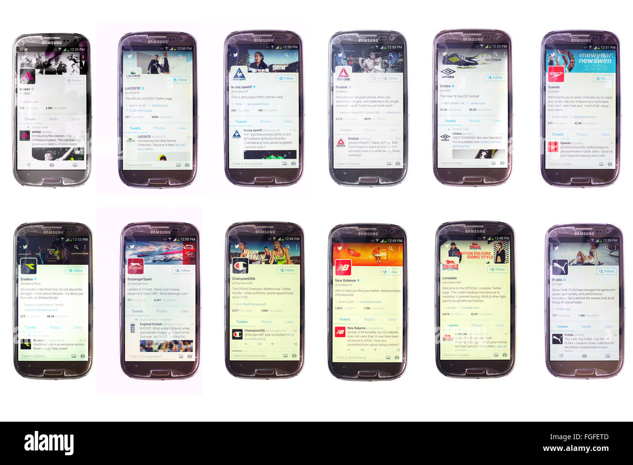Sportbekleidung-Unternehmen twitter-Konten auf die Bildschirme von Smartphones vor weißem Hintergrund fotografiert. Stockfoto