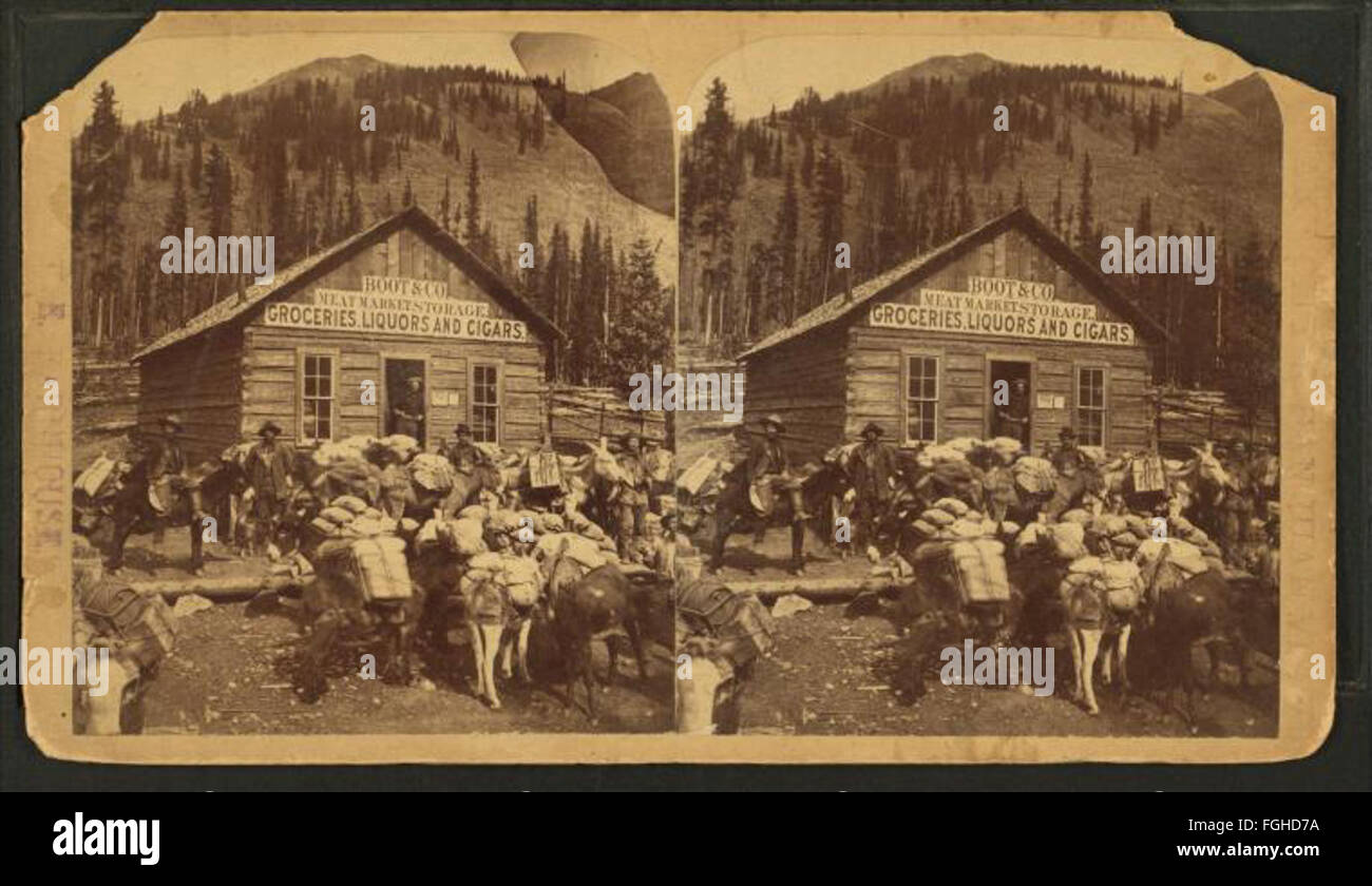 Ein Foto von T. E. Barnhouse vom Boot & Co. General Store, auf dem der Fleischmarkt, Lebensmittel, Liköre und Zigarren ausgestellt sind. Stockfoto
