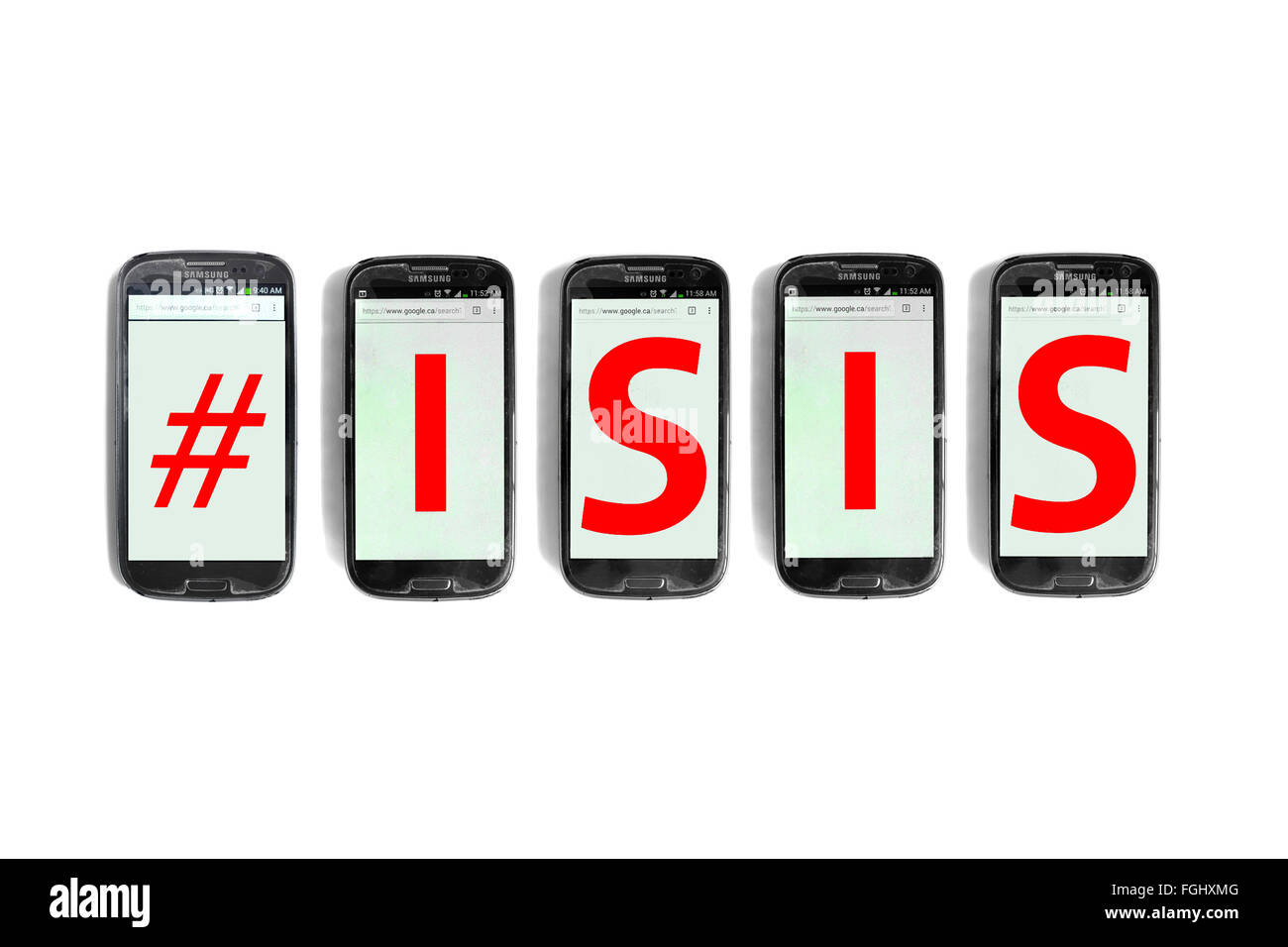 Der Hashtag #ISIS geschrieben am Smartphone Bildschirme vor weißem Hintergrund fotografiert. Stockfoto