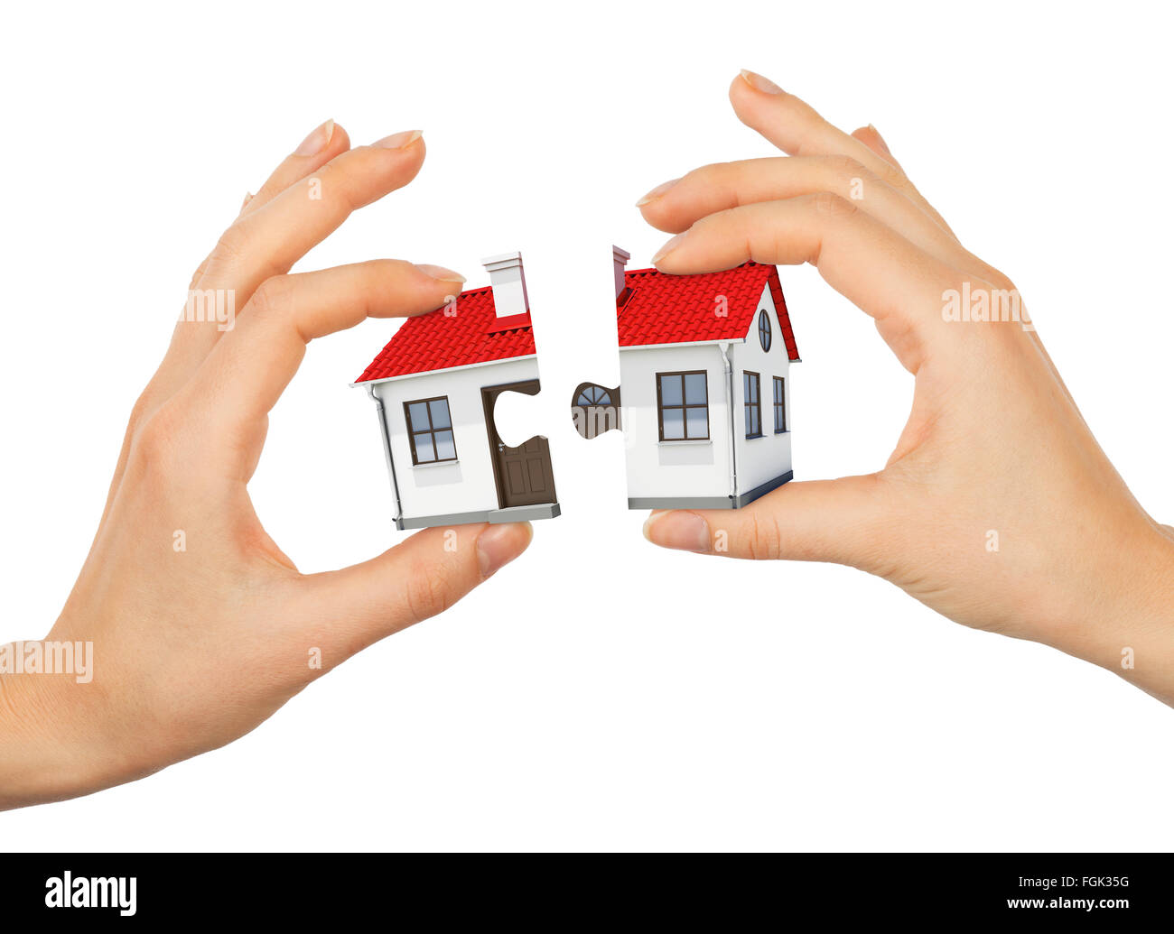 Womans Hand machen Haus puzzle Stockfoto