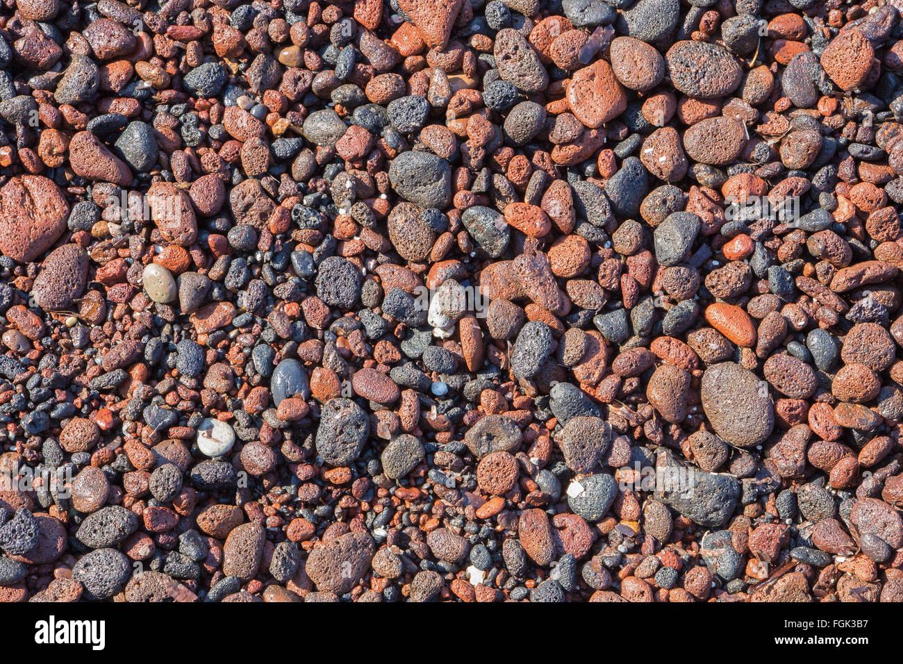 Santorini - die Details der Bimsstein aus roten Strand Stockfoto